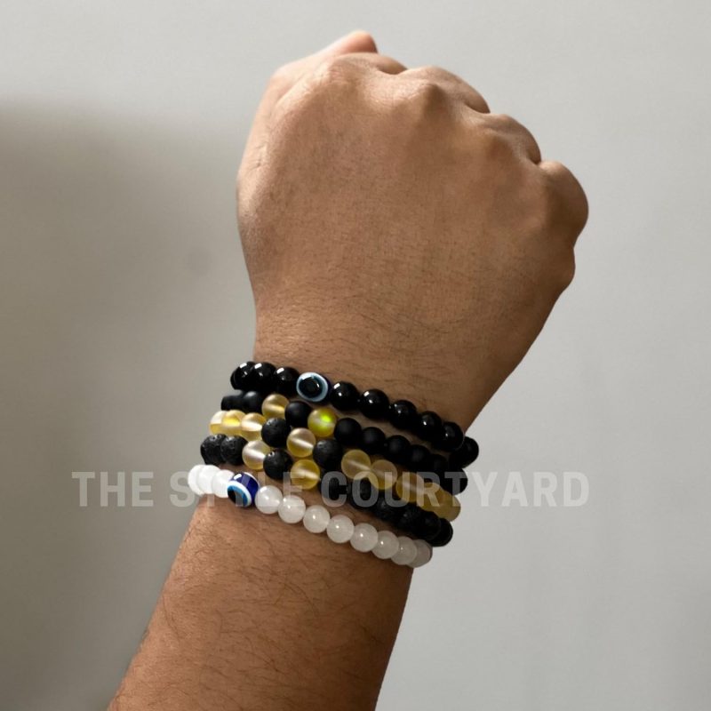 et of 5 Bead Bracelets Featuring Yellow Aura, Lava, Black Onyx, White Evil Eye, and Black Evil Eye Bracelets
