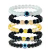 Amplify & rejuvenation your energy Harmonious with Set of 5 Bead Bracelets Featuring Yellow Aura, Lava, Black Onyx, White Evil Eye, and Black Evil Eye Bracelets